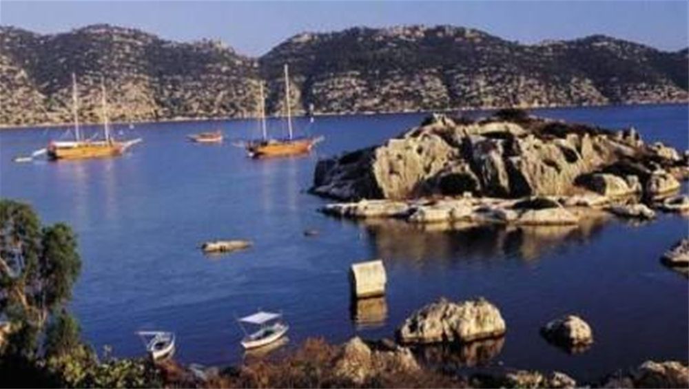 Charter Yachts at anchor in Kekova, Turkey - visit by chartering a Crewed or Bareboat yacht from Gocek with OceanBLUE